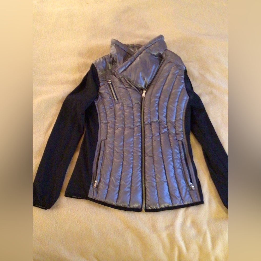 Calvin Klein Performance Lightweight grey puffer jacket with nylon sleeves.